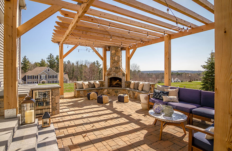 Large patio with ornate fireplace